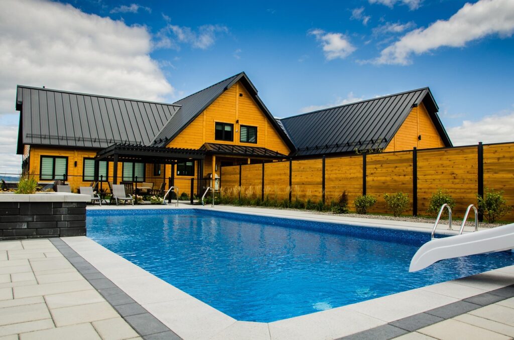 swimming pool, luxury, nature, body of water, swim, sky, architecture, no person, house, building construction, quebec